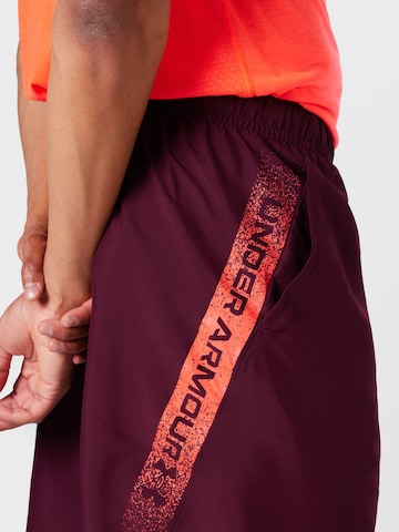 UNDER ARMOUR Regular Workout Pants in Red
