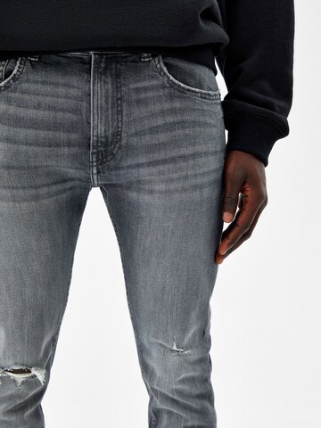 Skinny Jeans di Bershka in grigio