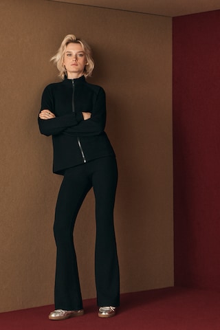 Tezenis Flared Pants in Black: front