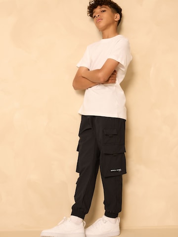 Tapered Pantaloni de la Next pe negru