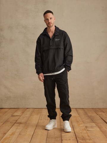 DAN FOX APPAREL Prehodna jakna 'Bennet' | črna barva