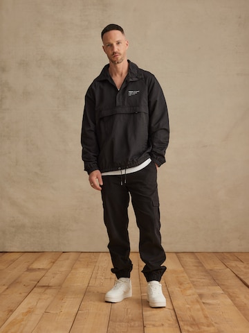 DAN FOX APPAREL Between-Season Jacket 'Bennet' in Black