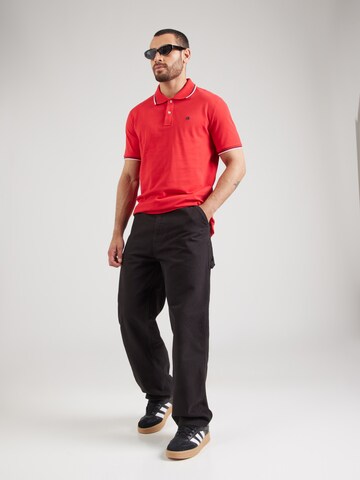 Maglietta di Champion Authentic Athletic Apparel in rosso