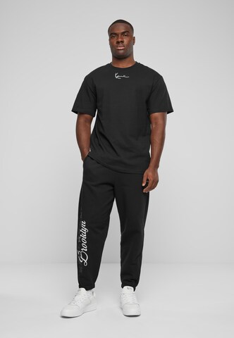 Karl Kani Tapered Pants in Black