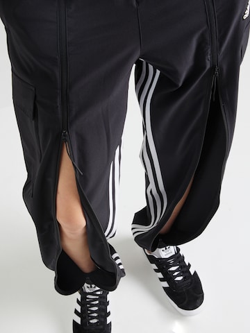 juoda ADIDAS SPORTSWEAR Siaurėjantis Sportinės kelnės 'Dance All-gender Versatile Woven Cargo Bottoms'