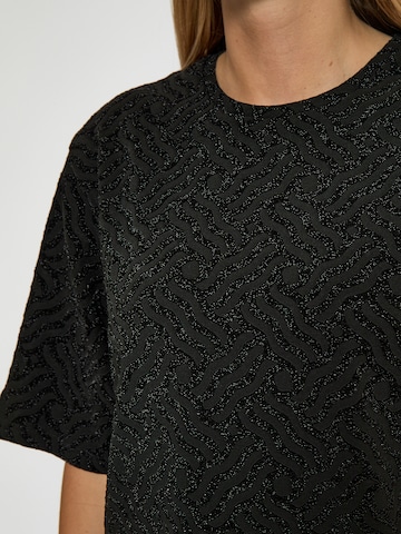 Top 'Lia' di Peppercorn in nero
