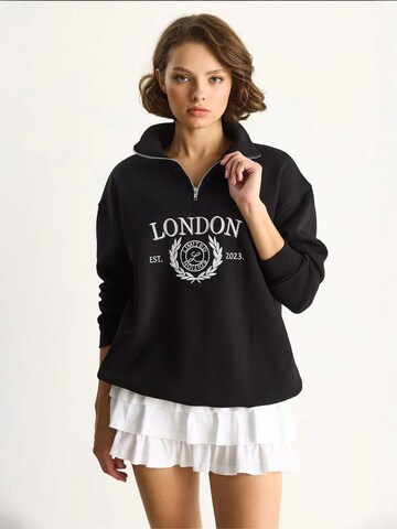 Sweat-shirt Bianco Lucci en noir : devant