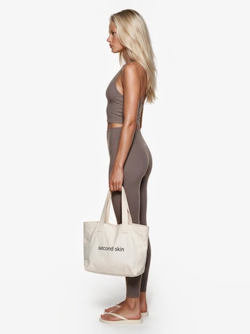 Haut de sport 'Second Skin Studio Halter Top' GOD SAVE QUEENS en marron
