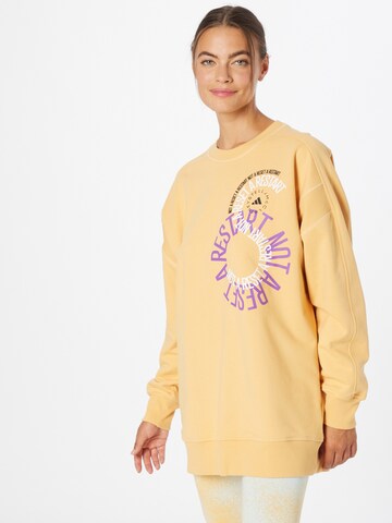 ADIDAS BY STELLA MCCARTNEY Αθλητική μπλούζα φούτερ σε κίτρινο: μπροστά