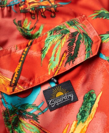 Shorts de bain Superdry en rouge