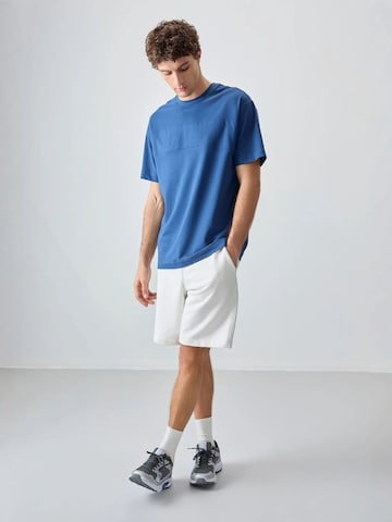 Tommy Life T-Shirts in Blau: Vorderseite