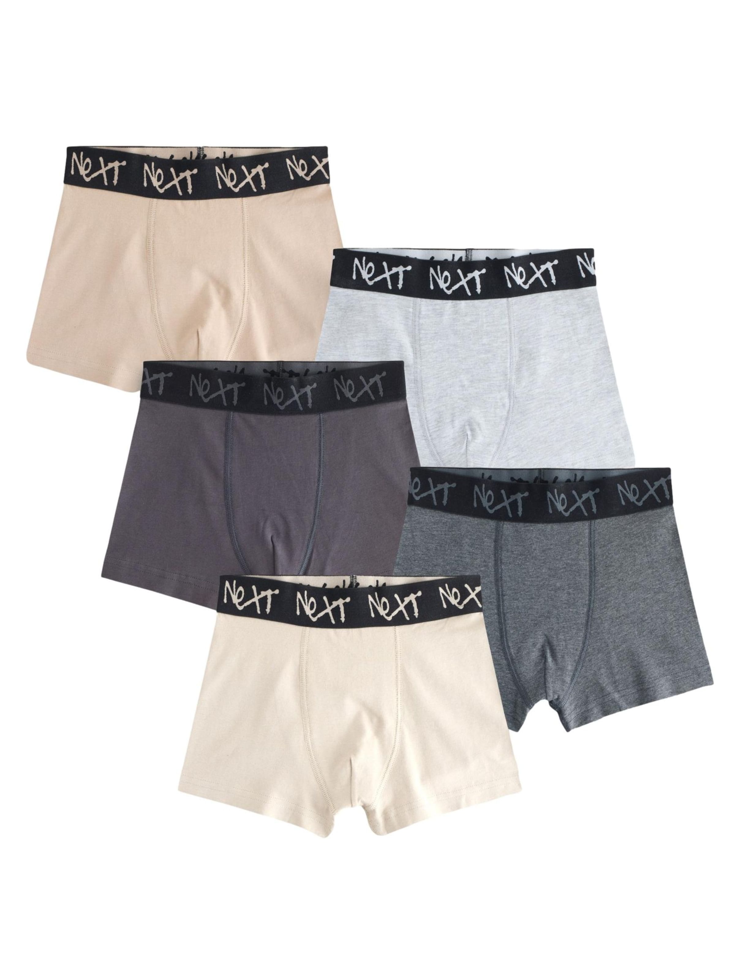 Next Kalsong i grå: framsida