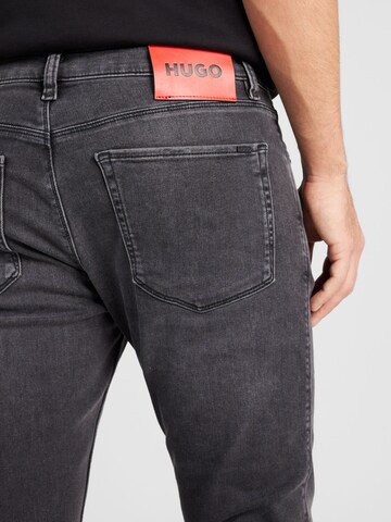 HUGO Slimfit Jeans '734' in Grau