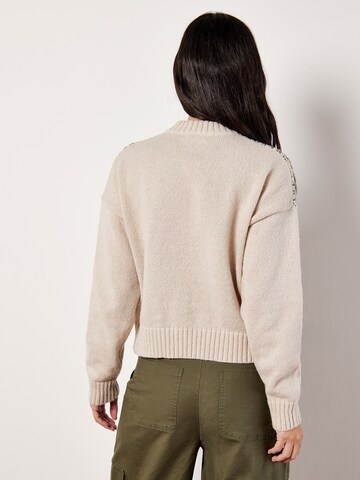 Pull-over ' ' Apricot en gris