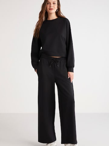 Trening de la Grimelange pe negru: față