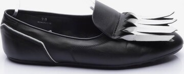 Tod's Flats & Loafers in 38 in Black: front