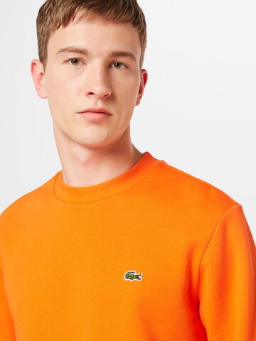 Sweat-shirt LACOSTE en orange