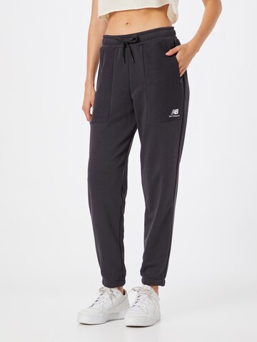 new balance Tapered Trousers in Black: front