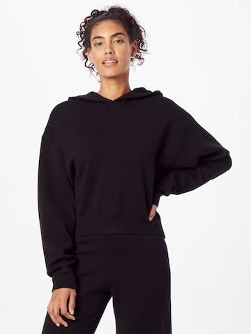 Onzie Athletic Sweater in Black: front