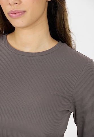 Athlecia Functioneel shirt 'Lankae' in Bruin