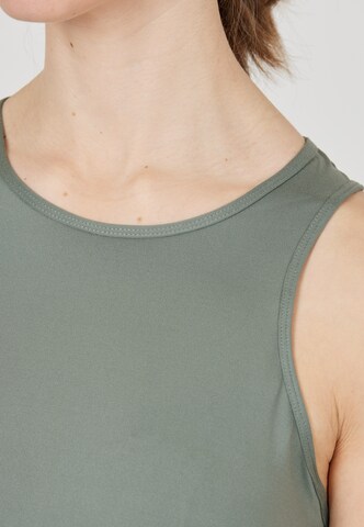 Athlecia Sports top 'Almi' in Green