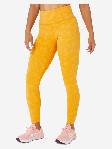 Skinny Pantalon de sport ASICS en jaune : devant