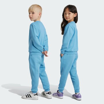 ADIDAS ORIGINALS Strój do biegania w kolorze niebieski