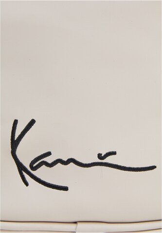 Borsa a tracolla di Karl Kani in beige