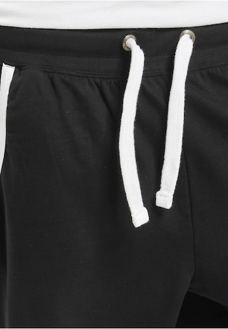 Effilé Pantalon de sport ' ' LONSDALE en noir