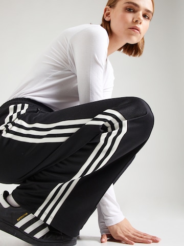 Loosefit Pantaloni 'Beckenbauer' de la ADIDAS ORIGINALS pe negru