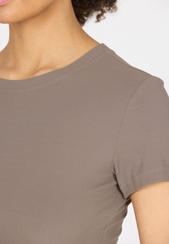 Athlecia Functioneel shirt 'Tinashe' in Bruin