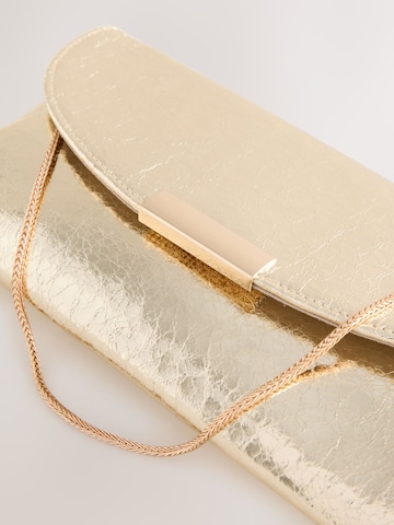 Clutch de la Next pe auriu