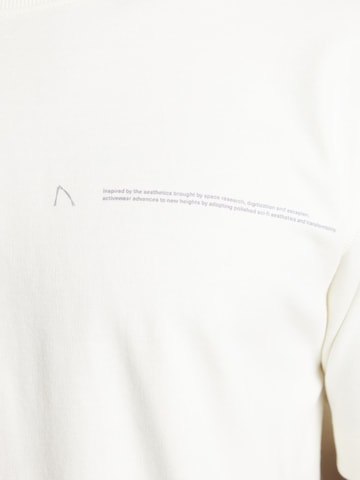 T-Shirt 'Script' CHASIN' en blanc