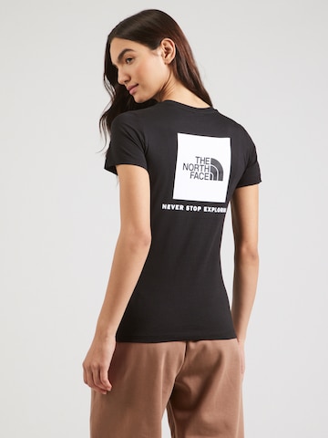 THE NORTH FACE T-shirt i svart: framsida