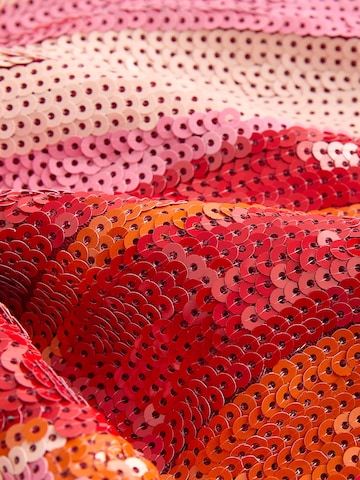 Haut Next en rouge
