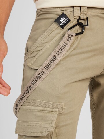 ALPHA INDUSTRIES Zwężany krój Bojówki w kolorze beżowy