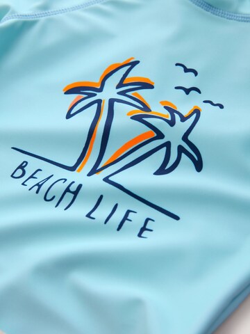 Next UV-suoja värissä sininen