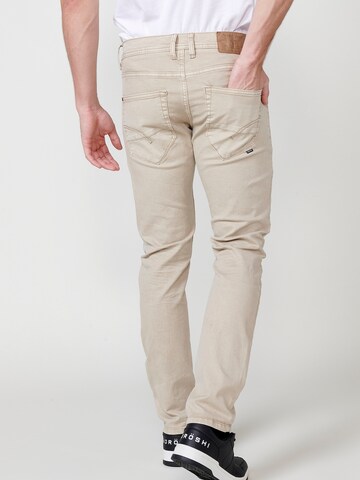 Coupe slim Jean KOROSHI en beige