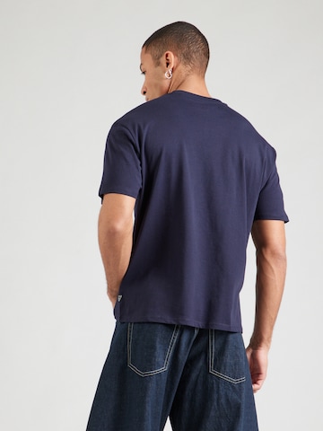 GUESS Bluser & t-shirts i blå
