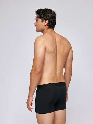 SNOCKS - Calzoncillo boxer en negro