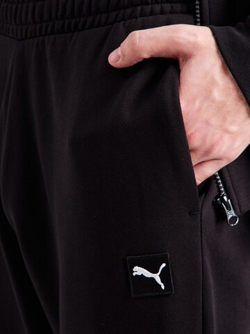 PUMA Zúžený Kalhoty 'ESS' – černá