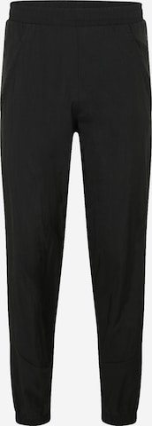 Reebok Tapered Sports trousers in Black: front