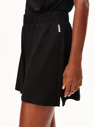 ARMEDANGELS Loose fit Trousers in Black: front