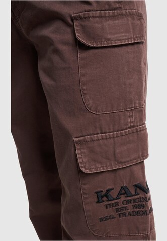 Largi Pantaloni cu buzunare de la Karl Kani pe maro