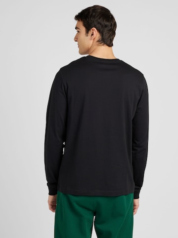 Reebok Performance shirt in Black