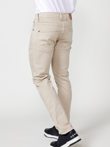 Coupe slim Jean KOROSHI en beige