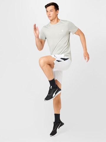 Regular Pantalon de sport MIZUNO en blanc
