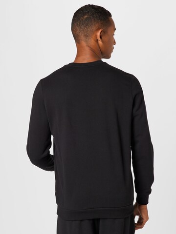 PUMA Sportsweatshirt 'Ess Elevated' in Schwarz