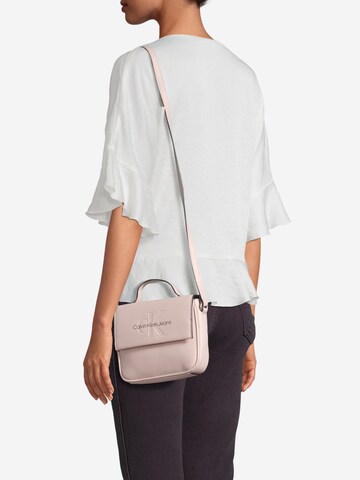 Calvin Klein Jeans Crossbody Bag in Pink