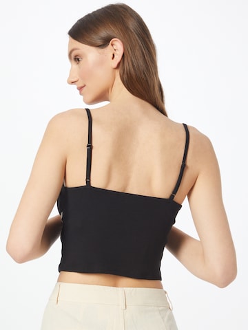 Top 'AZYM KENYA' di NEON & NYLON in nero